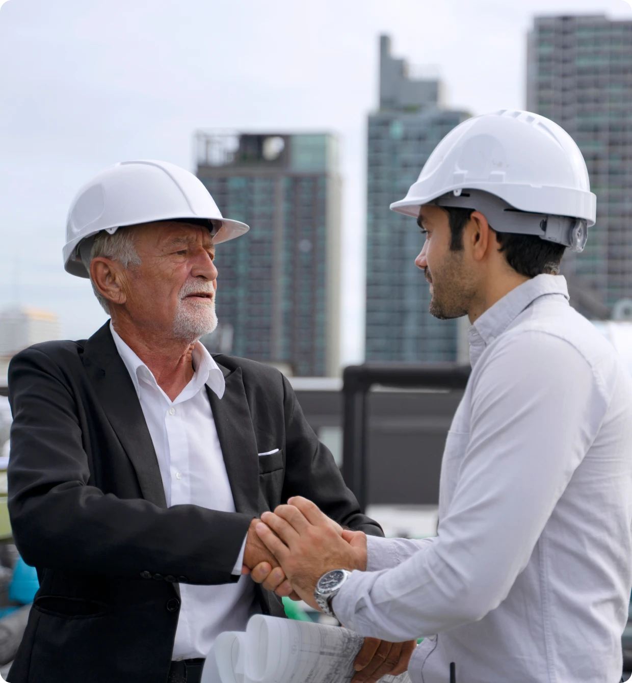 Construction professionals meeting on rooftop
