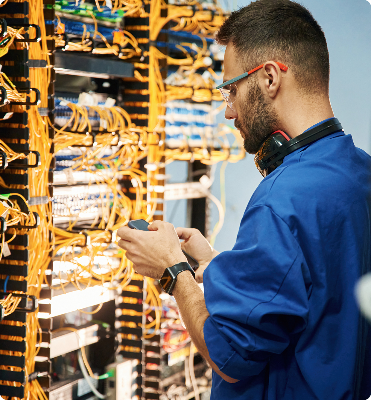 Technician working on server cables